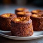 Close-up of Irresistible Mini Carrot Cakes, golden brown and ready to be enjoyed.