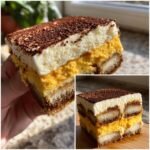 A layered slice of Irresistible Pumpkin Tiramisu showing pumpkin cream, white mascarpone, and ladyfingers, dusted with cocoa.