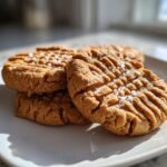Close-up of delicious Salted Peanut Butter Cookies Gluten Free with fork marks and sea salt flakes.
