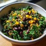 Close-up of the Ultimate Summer BBQ Chopped Kale Salad featuring kale, corn, black beans, quinoa, and pumpkin seeds.